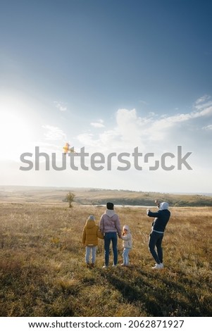 Similar – Image, Stock Photo Young couple taking a walk near the coast