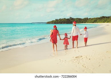 Happy Family With Kids On Tropical Christmas Vacation