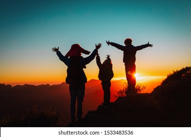 happy family with kids travel in sunset mountains - Shutterstock ID 1533483536