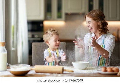 happy family in the kitchen. mother and  child son preparing the dough, bake cookies
 - Powered by Shutterstock