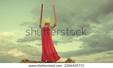 happy family. little boy playing with ball sunset wearing golden paper crown. chidhood dream. kid child plays park against sky. superhero child red cape. superhero child play concept.outdoors. chid.