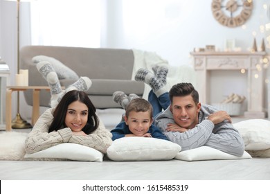 Happy Family With Little Son Spending Time Together At Home. Winter Vacation