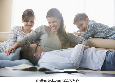 Happy Family In Living Room