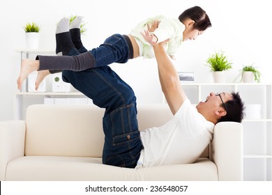 Happy Family In Living Room