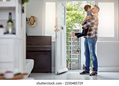 Happy family, love and father hug son, happy and excited to return home, hello and bond. Happy family, greeting and child embrace parent at front door, coming home and content, happiness and playful - Powered by Shutterstock