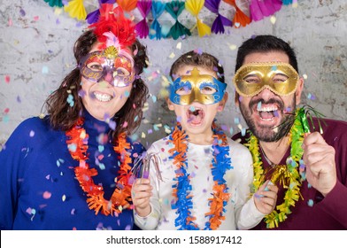 Happy Family With Masks Celebrating Carnival