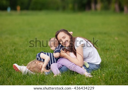 Similar – Mother playing with her daughter on the grass