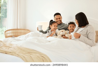 Happy family, morning and relax with children in bed for coffee, start or bonding at home. Mother, father and kids laughing with smile for holiday, weekend or funny joke together in bedroom at house - Powered by Shutterstock