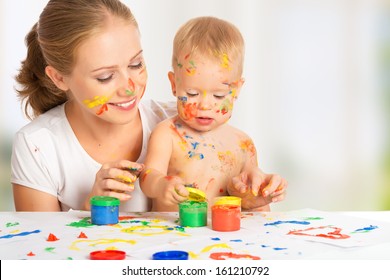 Happy Family Mother And Baby Paint Colors Hands Dirty