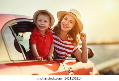 happy  family mother and child boy goes to summer travel trip in the car