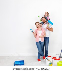  Happy Family Mother Father And Child Daughter Are Doing Repairs Paint Wall At Home