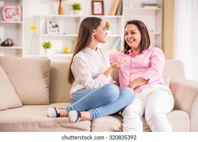 A Happy Family. Mother And Teen Daughter At Home.