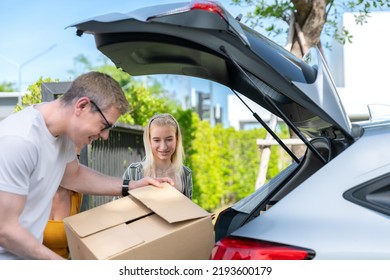 Happy Family Move Furniture Box And Packaging For Moving And Shipping To New Home After Shopping In Store From Car In Happy And Relax Holiday