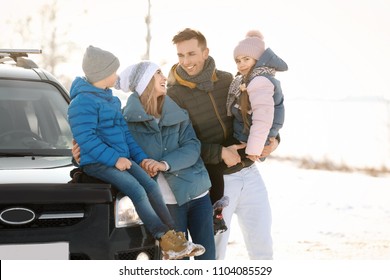 Happy Family Near Car On Winter Day