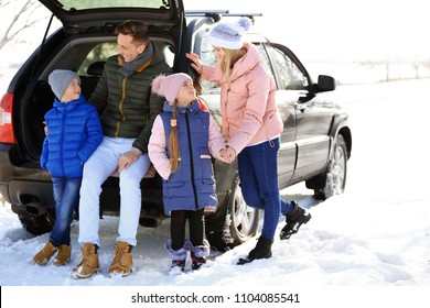 Happy Family Near Car On Winter Day