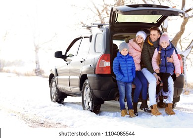 Happy Family Near Car On Winter Day