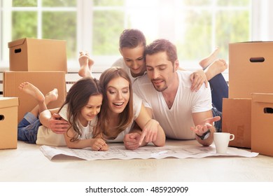 happy family in new home - Powered by Shutterstock