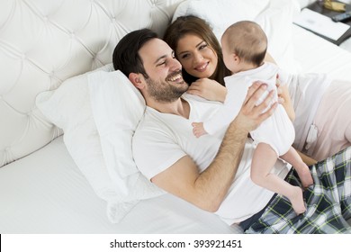 Happy Family With Newborn Baby