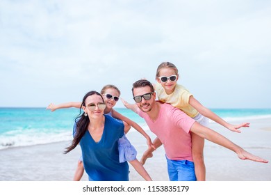 Happy Family On Beach During Summer Stock Photo (Edit Now) 1153835179