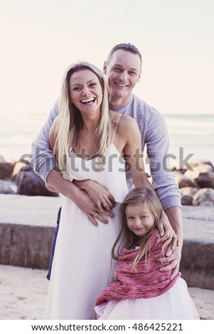 Happy family on the beach, soft selective focus, toning