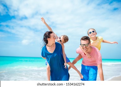 Happy Family On Beach Summer Vacation Stock Photo (Edit Now) 1534797014