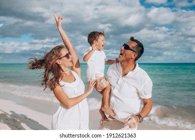 Happy family on the beach. Family vacation