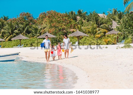 Happy family on the beach vacation