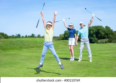 Happy Family On Golf Course