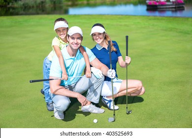 Happy Family On Golf Course