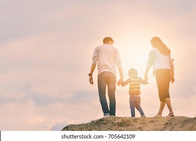 Happy Family On A Family Holiday, Have Fun Together. This Will Be The Smile Of Parents