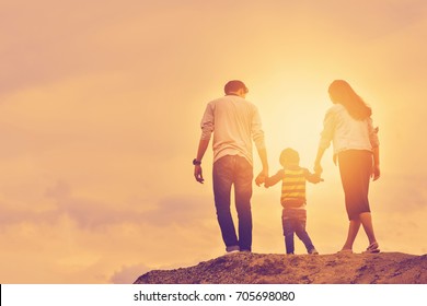 Happy Family On A Family Holiday, Have Fun Together. This Will Be The Smile Of Parents