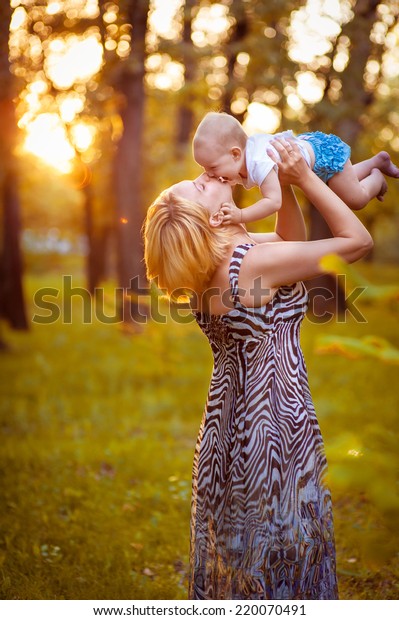 Happy Family On Nature Outdoors Mother Stock Photo (Edit Now) 220070491