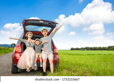 Happy Family On  Road Trip In The Car. Having Fun With Summer Vacation