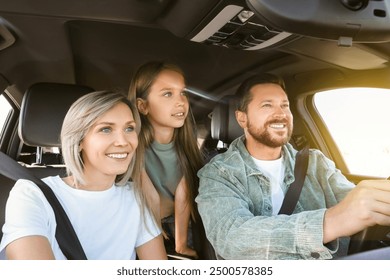 Happy family on road trip. Parents with daughter in car - Powered by Shutterstock