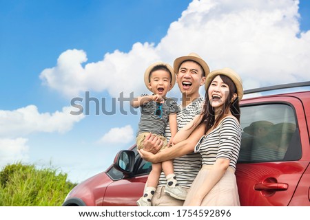 Similar – Image, Stock Photo Mother enjoying summer vacations holding, playing and lifting his infant baby boy son high in the air on sandy beach on Lanzarote island, Spain. Family travel and vacations concept