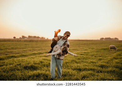 Happy family on the summer walk! Father and daughter walking outdoors on an animal field and enjoying the beautiful nature. - Powered by Shutterstock