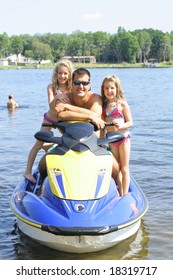 Happy Family On The Water