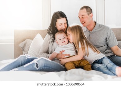 Happy Family On White Bed Bedroom Stock Photo 1050690554 | Shutterstock