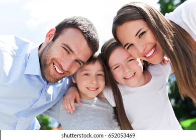 Happy Family Outdoors
