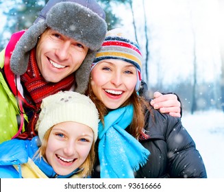 Happy Family Outdoors. Snow.Winter Vacation