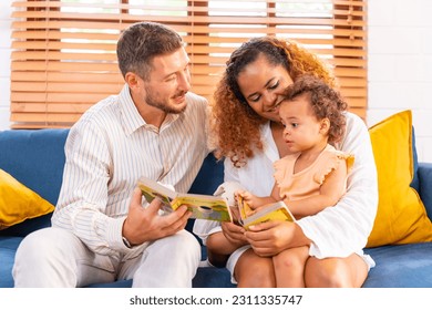 Happy family parents and child spending time together at home. Father, mother and little daughter playing together in living room at home on holiday vacation. Parenting and family relationship concept - Shutterstock ID 2311335747