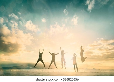 Happy family people group celebrate jump for good life on weekend concept for win victory, person faith in financial freedom healthy wellness, Great employee team support retreat together in summer. - Shutterstock ID 526820656
