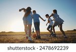 happy family playing ball in the park. group of children playing ball in nature. happy family kid dream concept. children playing lifestyle sunset soccer in the park in nature