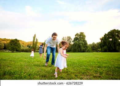 Family Park Happy Parents Children Walk Stock Photo (Edit Now) 482887510