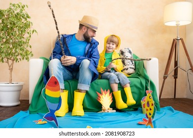 Happy Family Playing. Dad And Son Enjoying A Fishing Trip. Father And Child Having Fun. Man And Kid At Home. Summer Vacation Concept