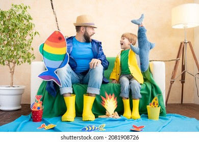 Happy Family Playing. Dad And Son Enjoying A Fishing Trip. Father And Child Having Fun. Man And Kid At Home. Summer Vacation Concept