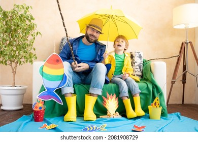 Happy Family Playing. Dad And Son Enjoying A Fishing Trip. Father And Child Having Fun. Man And Kid At Home. Summer Vacation Concept