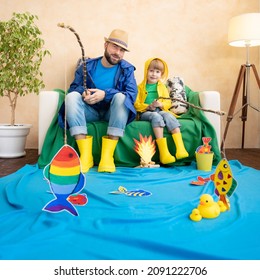 Happy Family Playing. Dad And Son Enjoying A Fishing Trip. Father And Child Having Fun. Man And Kid At Home. Summer Vacation Concept