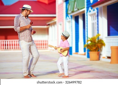 Happy Family Playing Music And Dancing On Caribbean Street