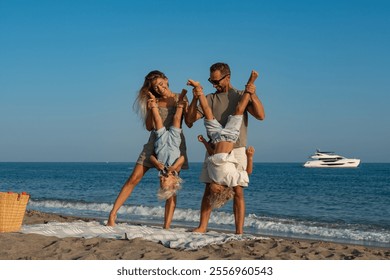 Happy Family Playing Upside Down on the Beach - Powered by Shutterstock